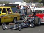 Pushng to make a run, Poacher,s top fuel car